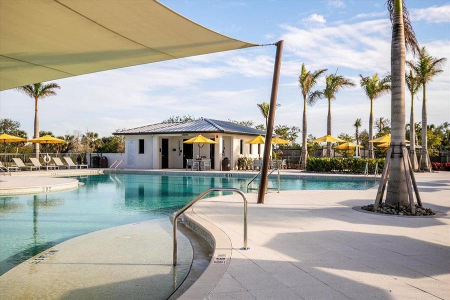 Front exterior of a new home in Sunstone at Wellen Park, Venice, FL, highlighting curb appeal (Image 25).