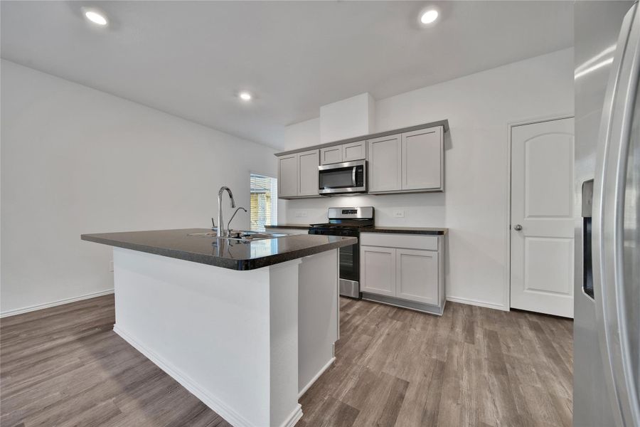 Furnished interior view inside a new home in Breckenridge Forest, Spring (Image 6).