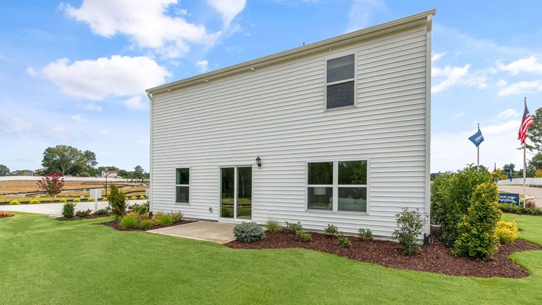 Representative exterior photo of a completed home built from the BELHAVEN by D.R. Horton in Lawson Glen, Clayton, NC (Image 24).