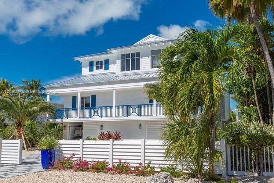 Front exterior of a new home in , Islamorada, Village of Islands, FL, highlighting curb appeal (Image 24).