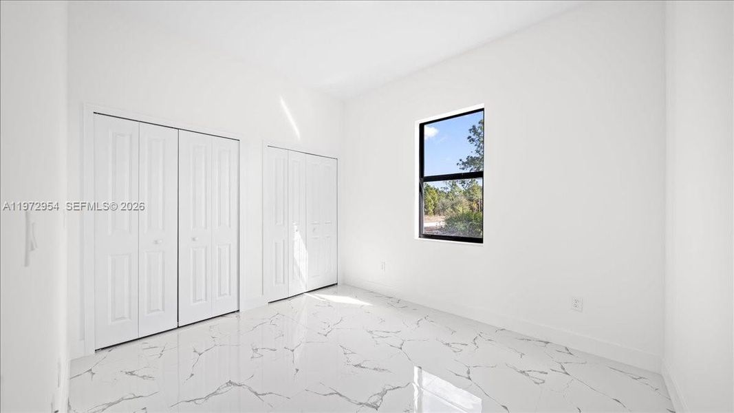 Spacious, unfurnished interior of a new home in , Lehigh Acres (Image 18).