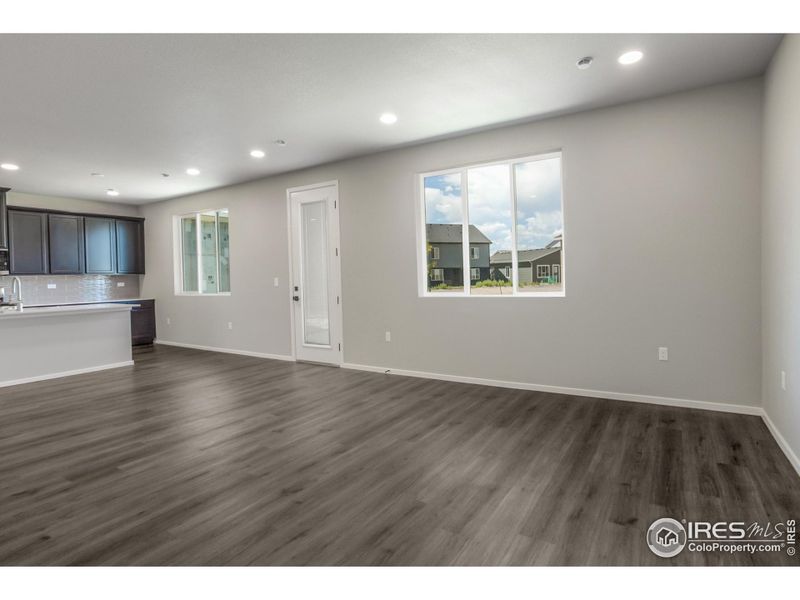 GREAT ROOM, DINING ROOM AND KITCHEN