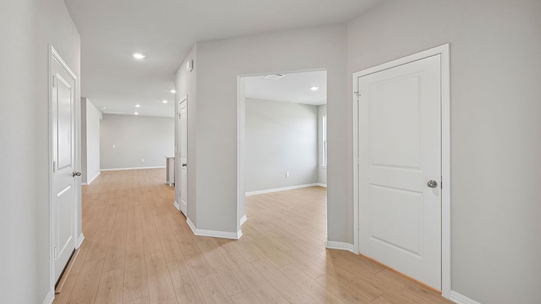 Spacious, unfurnished interior of a new home in Carillon, Manor (Image 23).
