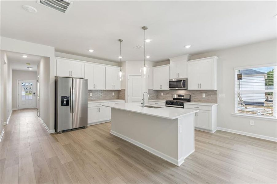 Furnished interior view inside a new home in Parkside at Grayson, Grayson (Image 13).