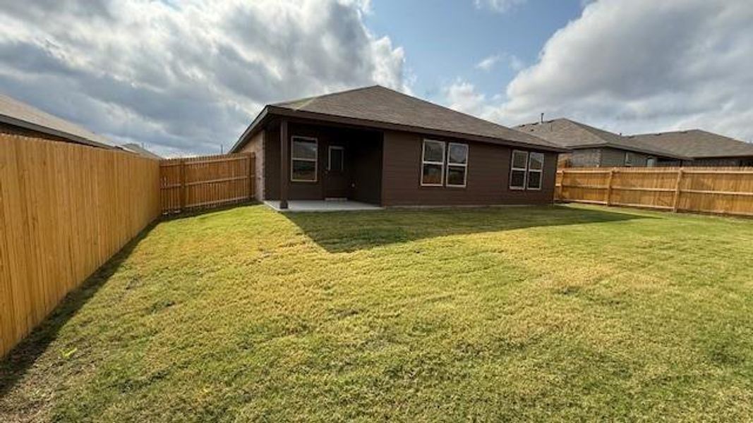 Rear Elevation and covered back Patio