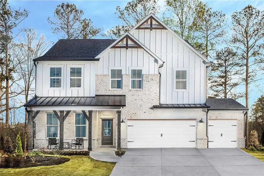 Front exterior of a new home in , Powder Springs, GA, highlighting curb appeal (Image 1). Front exterior of a new home in , Powder Springs, GA, highlighting curb appeal (Image 1).
