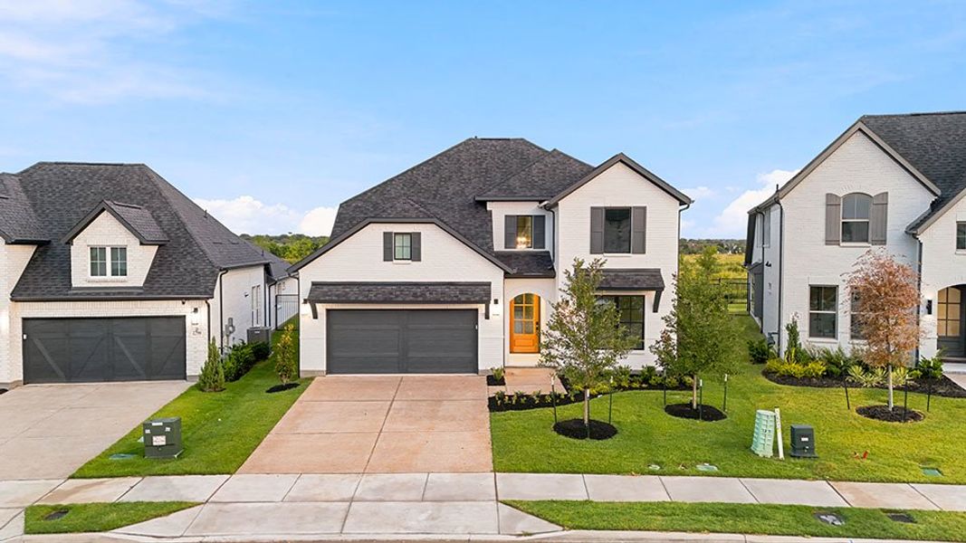 Front exterior of a new home in Brookhollow West, Prosper, TX, highlighting curb appeal (Image 25).