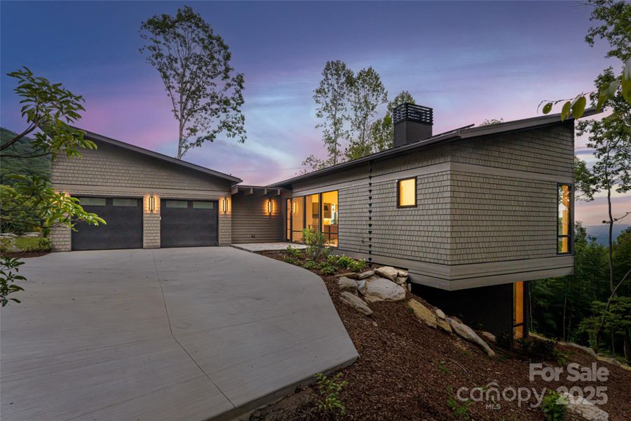 Front exterior of a new home in , Hendersonville, NC, highlighting curb appeal (Image 23).