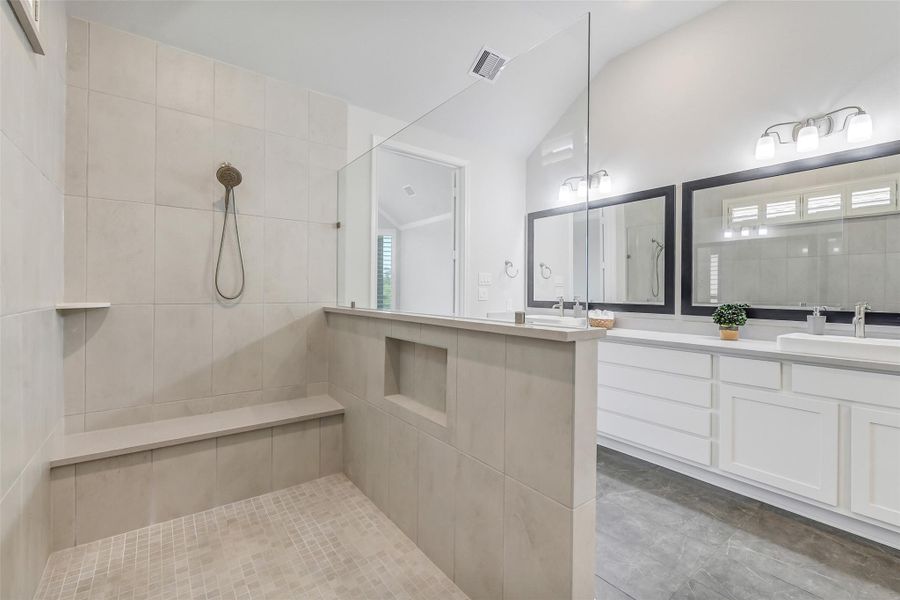 Shower has a bench and shelf and inset for convenience of holding shampoo, etc. Shower has a bench and shelf and inset for convenience of holding shampoo, etc.
