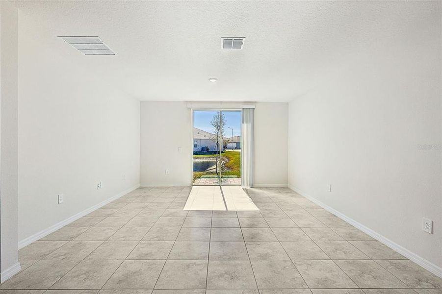 Spacious, unfurnished interior of a new home in Lake Deer Estates - Classic Series, Poinciana (Image 32).