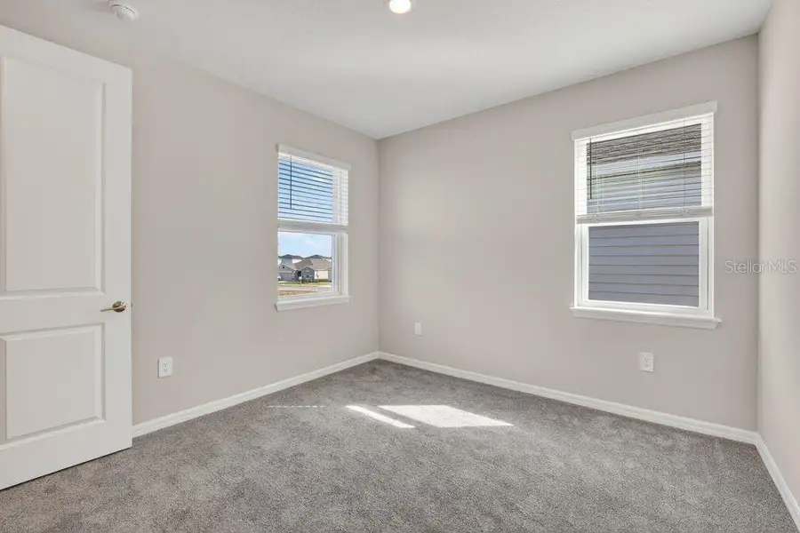 Spacious, unfurnished interior of a new home in Firethorn, Parrish (Image 20).