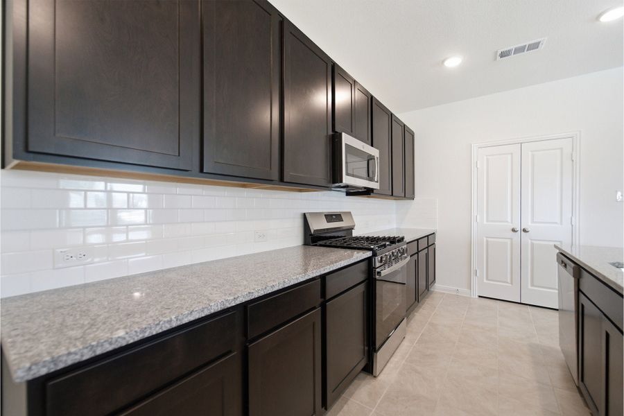 Furnished interior view inside a new home in Sagebrook, Argyle (Image 9).