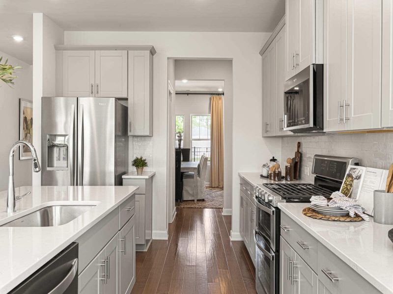Furnished interior view inside a new home in The Coves at Lakes of Cane Bay, Summerville (Image 11).