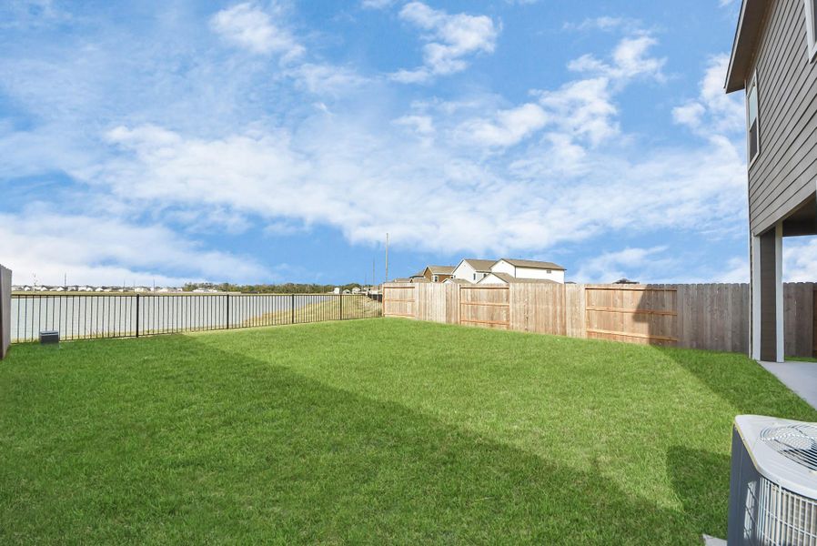 Fully fenced back yard with patio, lake view, no back neighbors