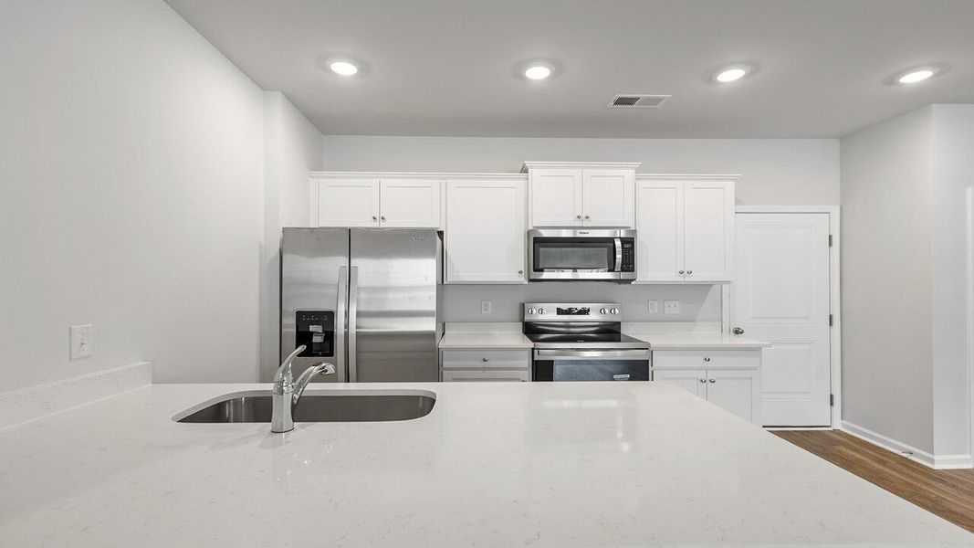 Furnished interior view inside a new home in The Crossing at St. James, Summerville (Image 12).