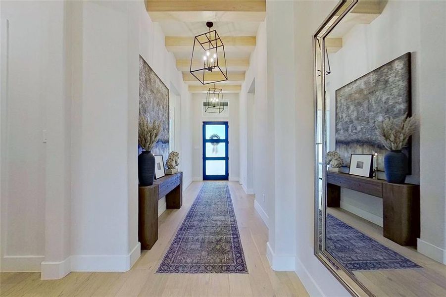 Stunning entry with beamed ceiling