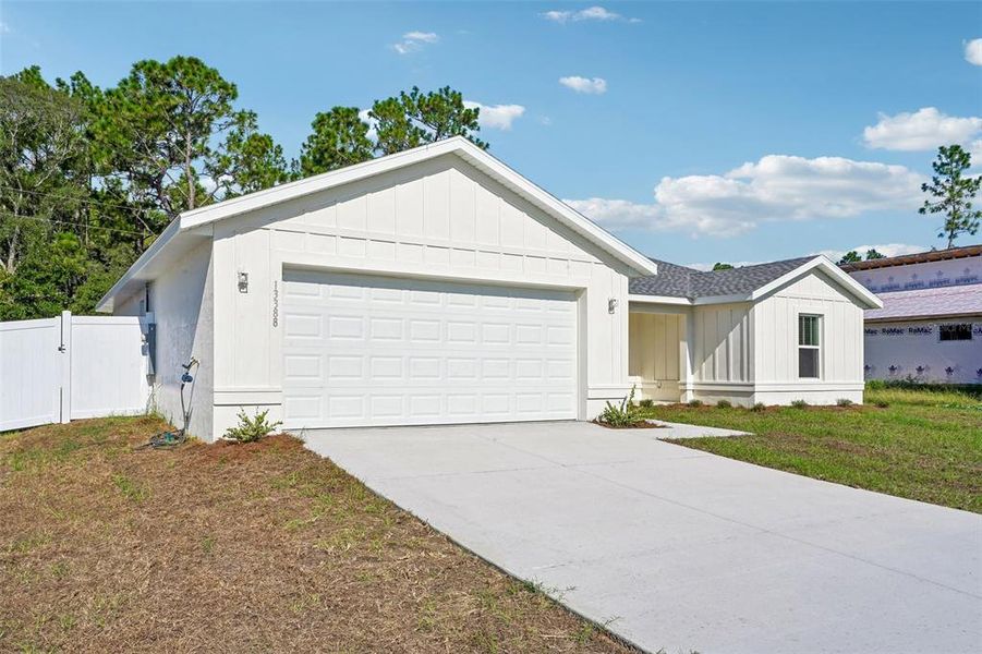 Front exterior of a new home in , Ocala, FL, highlighting curb appeal (Image 22). Front exterior of a new home in , Ocala, FL, highlighting curb appeal (Image 22).