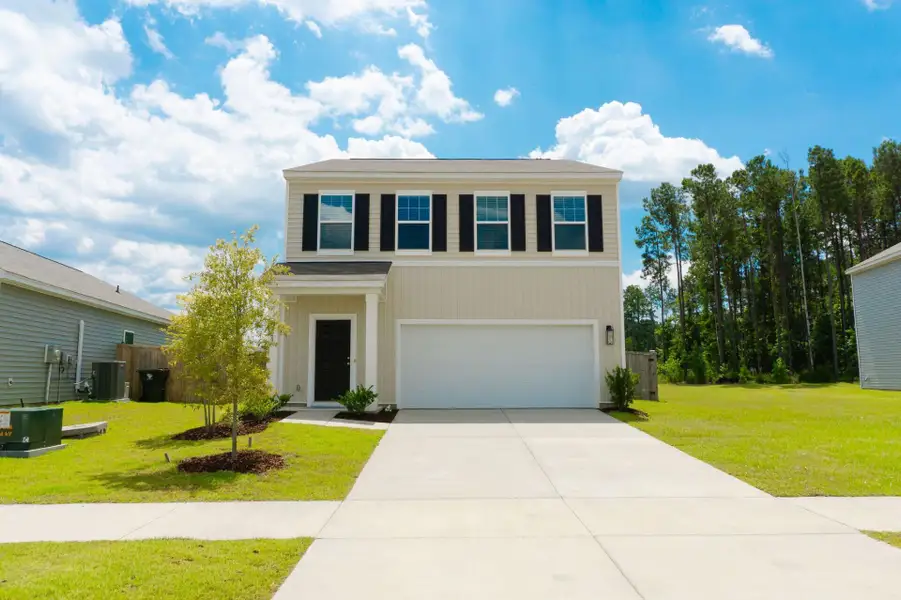 Front exterior of a new home in , Summerville, SC, highlighting curb appeal (Image 2). Front exterior of a new home in , Summerville, SC, highlighting curb appeal (Image 2).