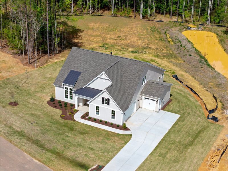Representative exterior photo of a completed home built from the The Bradley by RobuckHomes in Baylee Ridge, Selma, NC (Image 58). Representative exterior photo of a completed home built from the The Bradley by RobuckHomes in Baylee Ridge, Selma, NC (Image 58).