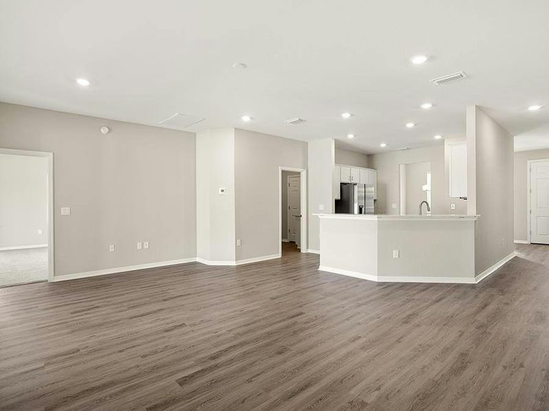 Enjoy a sunny layout with an open gathering room and kitchen - Savannah by Highland Homes