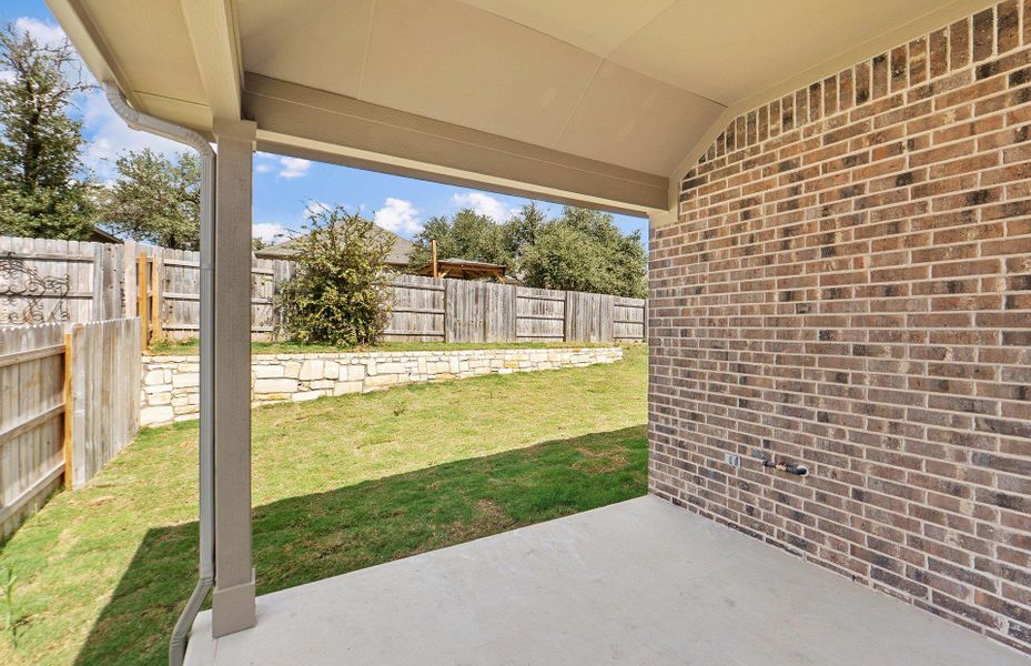 Exterior details and patio area of a home in Crescent Bluff, Georgetown (Image 18).