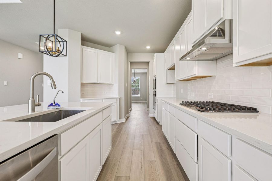 Photo is not of the actual home, but is an inspirational photo of builder’s model home and may depict options, furnishings, and/or decorator features that are not included