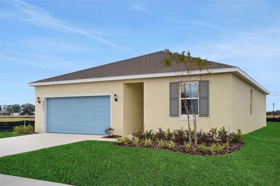 Front exterior of a new home in Annabelle Estates, Lake Wales, FL, highlighting curb appeal (Image 17).