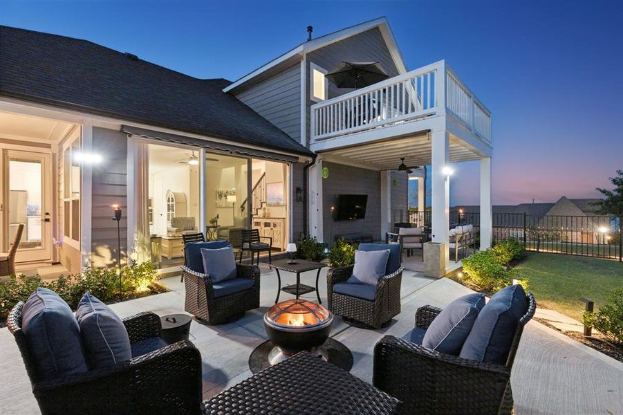 Multiple seating areas, covered outdoor spaces, and views of the lake create an outdoor environment that’s equally suited for quiet evenings or lively gatherings.