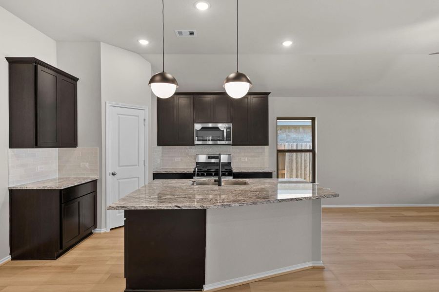 Furnished interior view inside a new home in Grand Central Park, Conroe (Image 14).