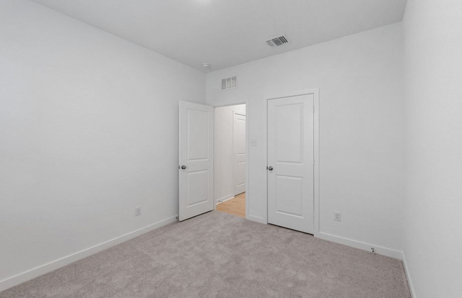 Spacious, unfurnished interior of a new home in Sunfield, Buda (Image 12). Spacious, unfurnished interior of a new home in Sunfield, Buda (Image 12).