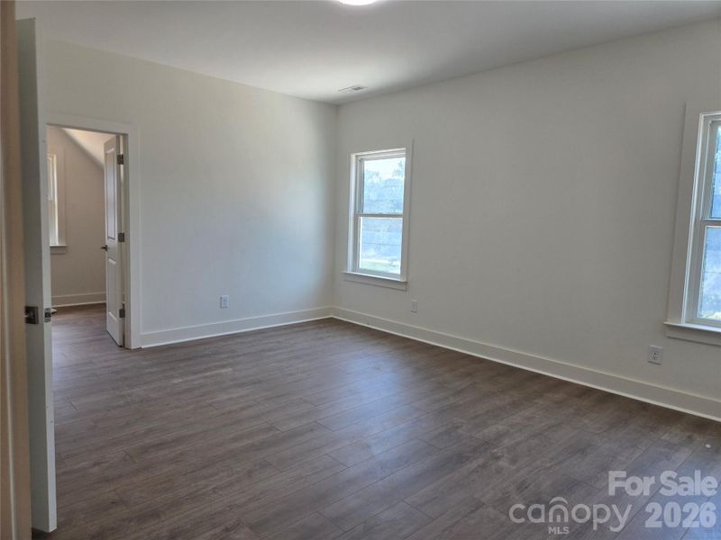 Spacious secondary bedroom featuring a large walk-in closet and direct access to the Jack and Jill bathroom. Spacious secondary bedroom featuring a large walk-in closet and direct access to the Jack and Jill bathroom.