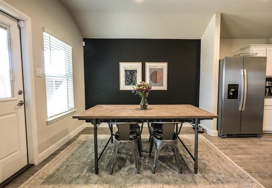 Dining area with an accent wall