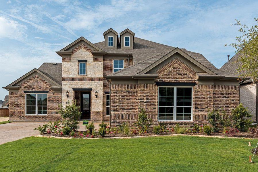 Front exterior of a new home in Somercrest, Midlothian, TX, highlighting curb appeal (Image 1).