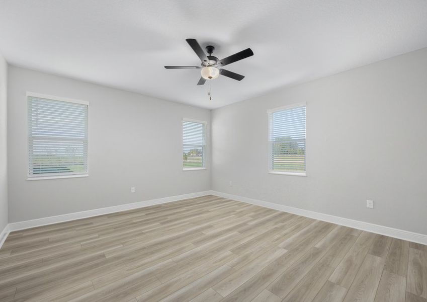 This master bedroom is flooded with natural light This master bedroom is flooded with natural light