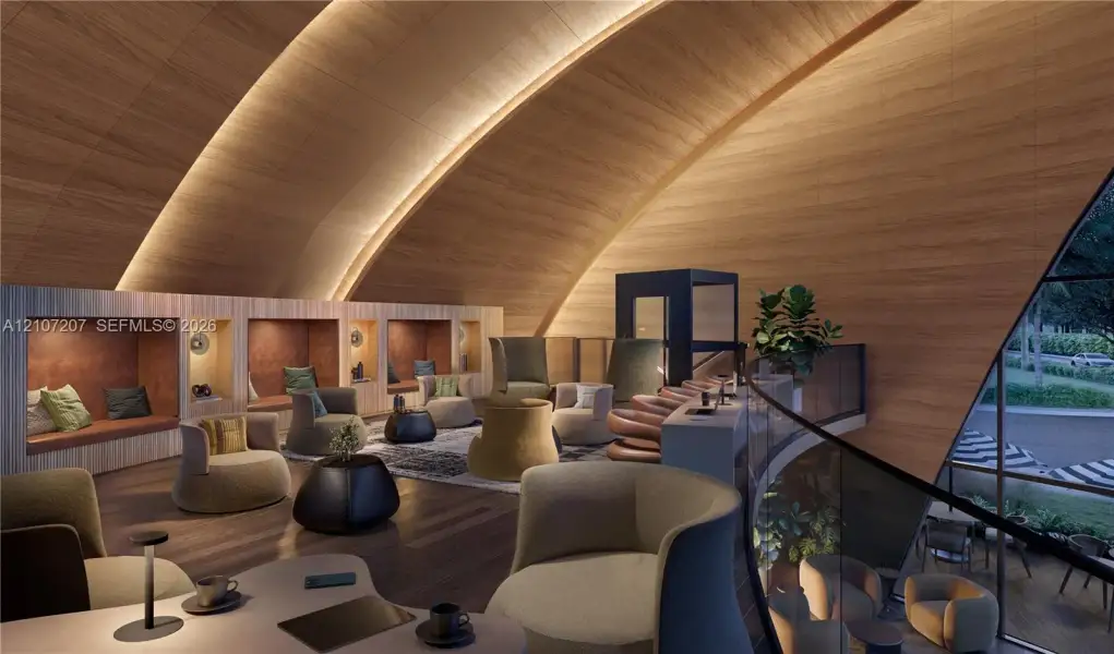 Curved wood-paneled ceiling, integrated recessed accent lighting, built-in recessed wall niches, dark wood-finish flooring, and expansive floor-to-ceiling glass wall Curved wood-paneled ceiling, integrated recessed accent lighting, built-in recessed wall niches, dark wood-finish flooring, and expansive floor-to-ceiling glass wall