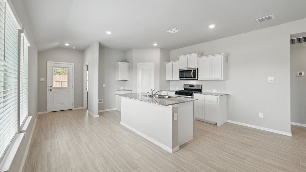 Furnished interior view inside a new home in Springhill South, Boyd (Image 7).