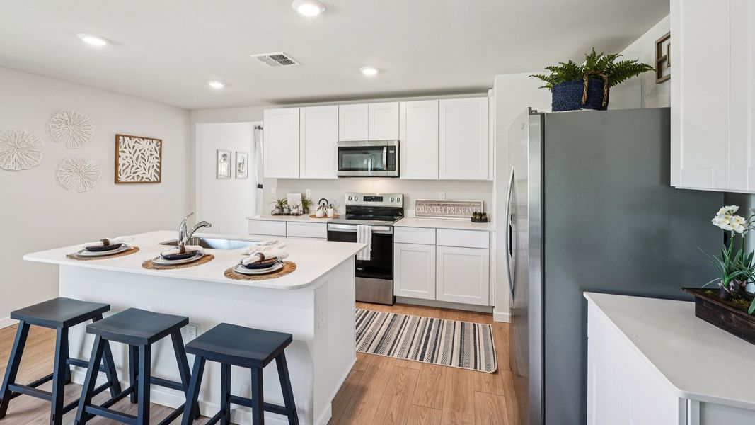 Furnished interior view inside a new home in Coral Bay - Express & Tradition, North Fort Myers (Image 14).
