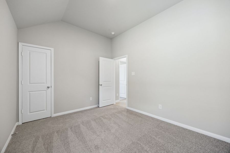 Bedroom in the Sabine home plan by Trophy Signature Homes – REPRESENTATIVE PHOTO Bedroom in the Sabine home plan by Trophy Signature Homes – REPRESENTATIVE PHOTO
