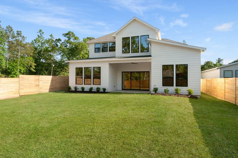 With its generous size and serene atmosphere, this backyard offers the ideal escape—whether you're hosting guests or unwinding after a long day. The covered patio extends the living space and invites year-round enjoyment. With its generous size and serene atmosphere, this backyard offers the ideal escape—whether you're hosting guests or unwinding after a long day. The covered patio extends the living space and invites year-round enjoyment.