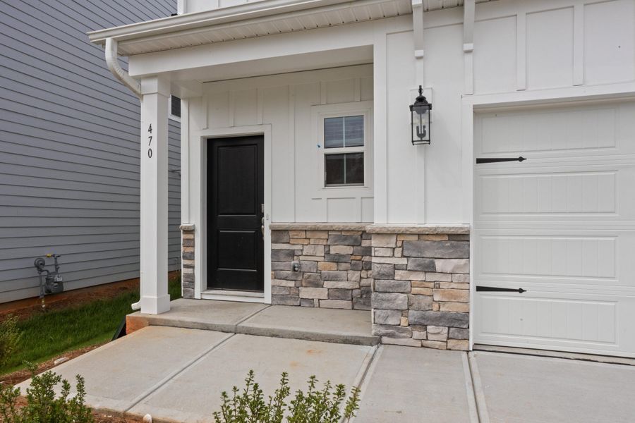 Exterior details and patio area of a home in The Pier South, Seneca (Image 16). Exterior details and patio area of a home in The Pier South, Seneca (Image 16).