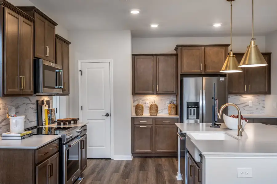 Representative furnished interior of a home built from the McKimmon by McKee Homes in Coventry Woods, Fayetteville (Image 8).