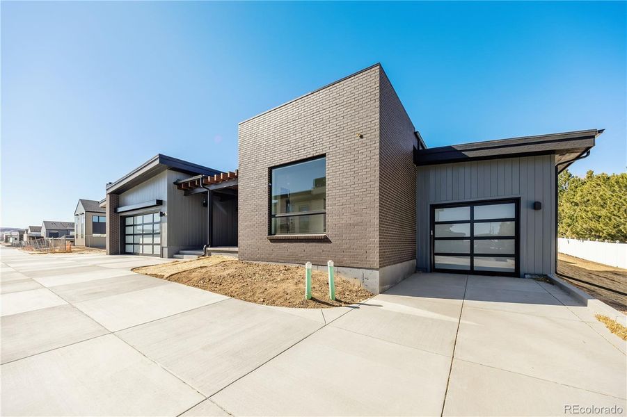 Front exterior of a new home in , Golden, CO, highlighting curb appeal (Image 2).