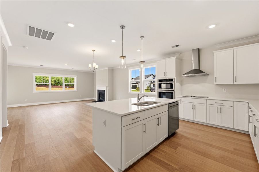 A pristine open-concept living space features a mo