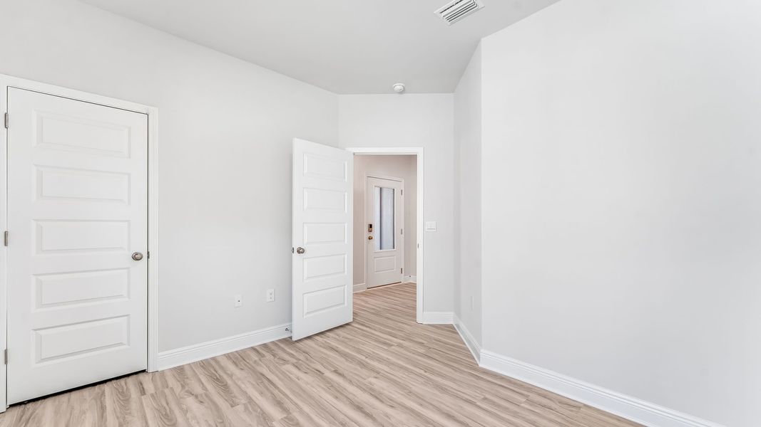 Spacious, unfurnished interior of a new home in WindMark Beach, Port Saint Joe (Image 20).