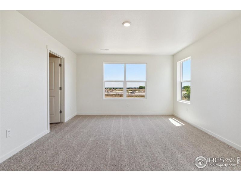 Spacious, unfurnished interior of a new home in Silver Peaks, Lochbuie (Image 22).