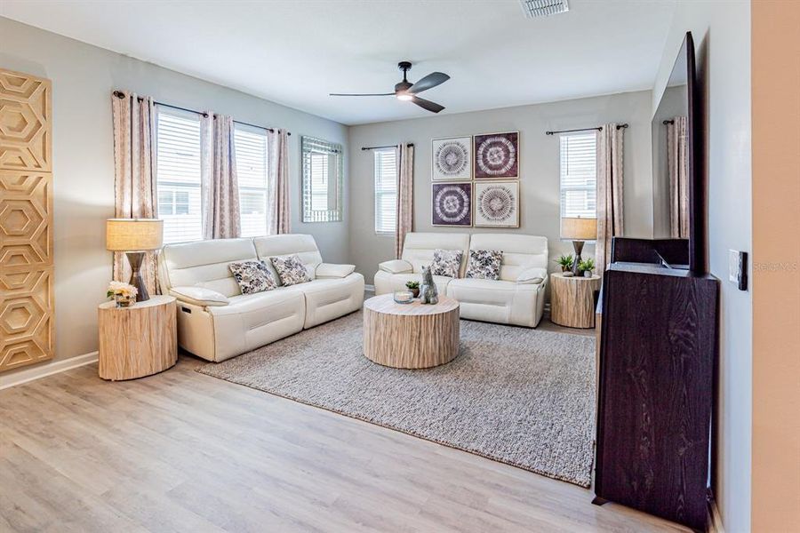 Furnished interior view inside a new home in Seasons at Lakeside Forest, Tavares (Image 49).