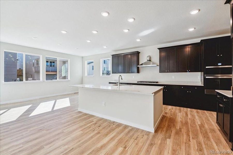 Furnished interior view inside a new home in Floret Collection at Alder Creek, Parker (Image 7).
