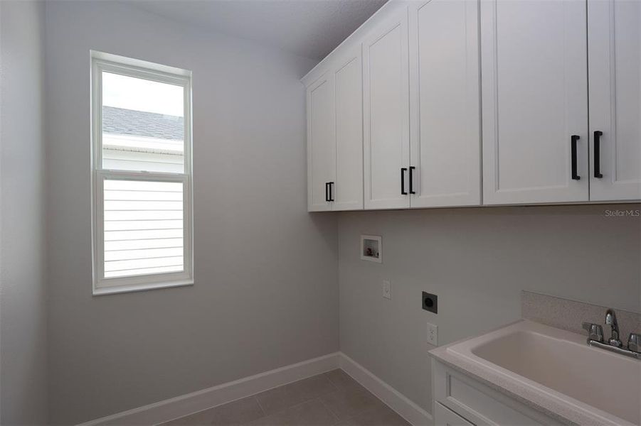 Furnished interior view inside a new home in Lake Star at Ovation, Winter Garden (Image 9).