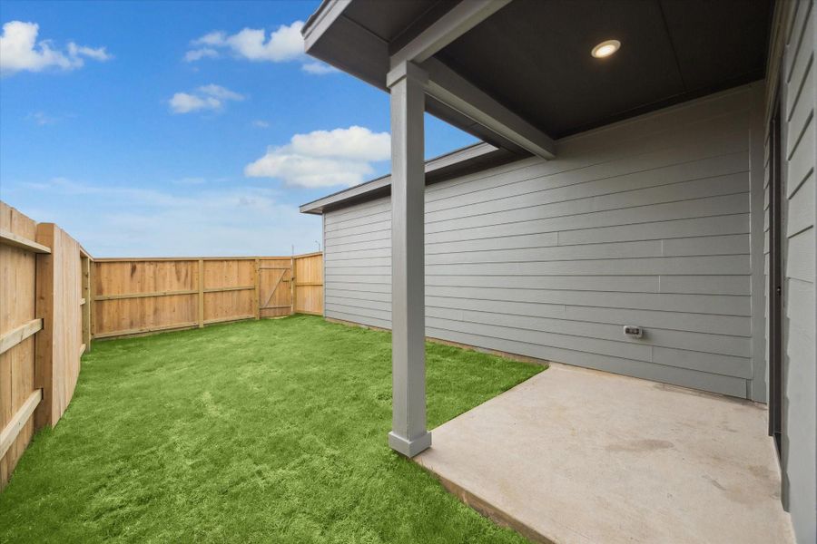 Exterior details and patio area of a home in Elyson, Katy (Image 21).
