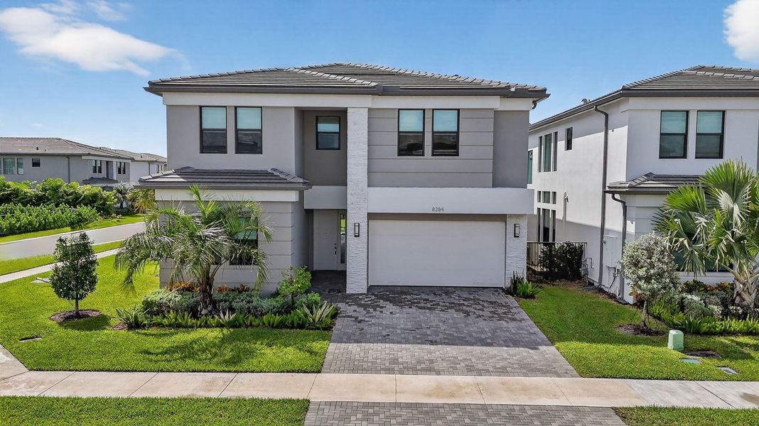 Front exterior of a new home in , Boca Raton, FL, highlighting curb appeal (Image 24).